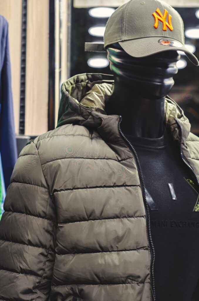 a mannequin wearing a new york yankees hat and jacket